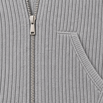 Lounge set dames in grijs – detail van ribstructuur, ritssluiting en vestzak