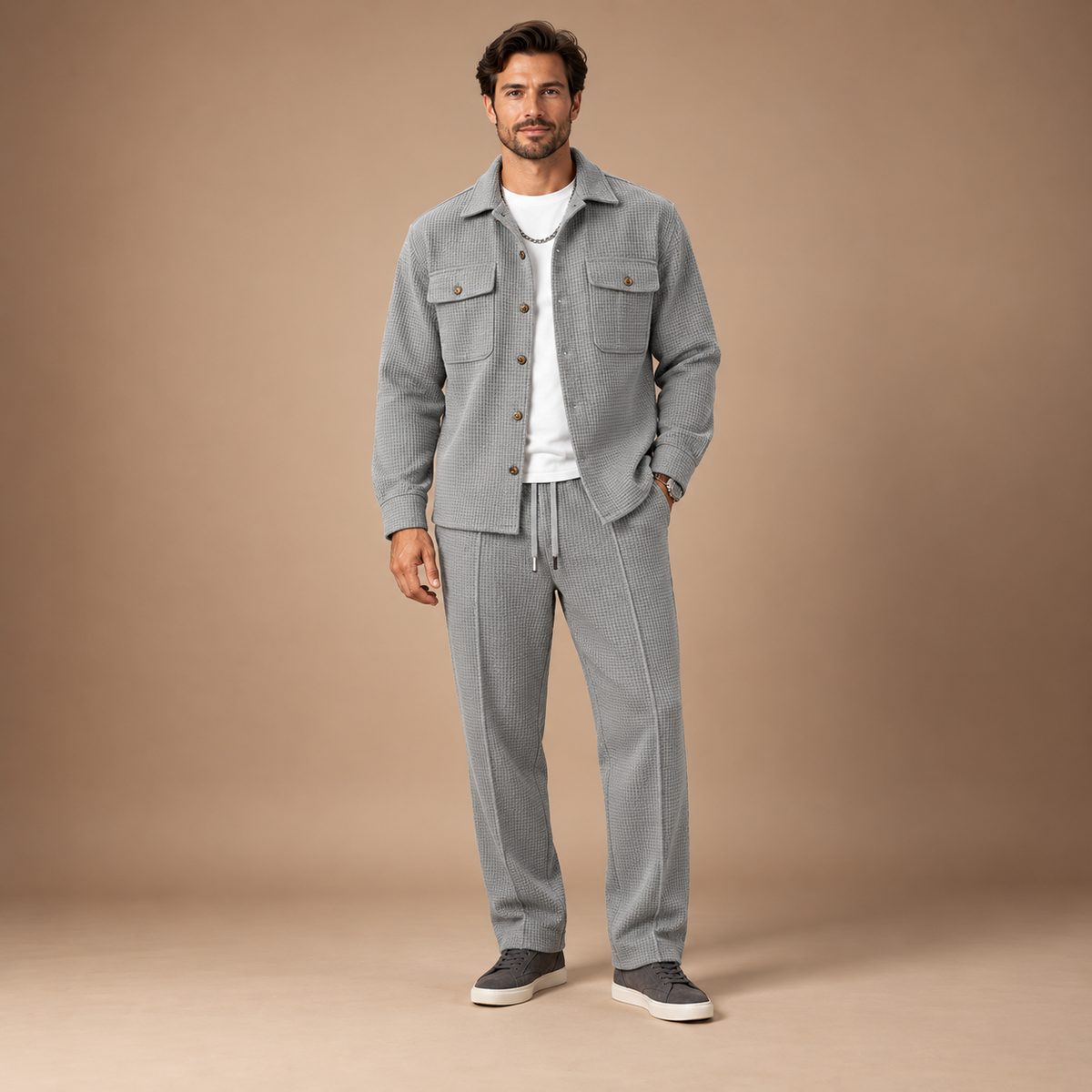 Tweedelig joggingpak heren met wafelstructuur in grijs – volledig outfitbeeld