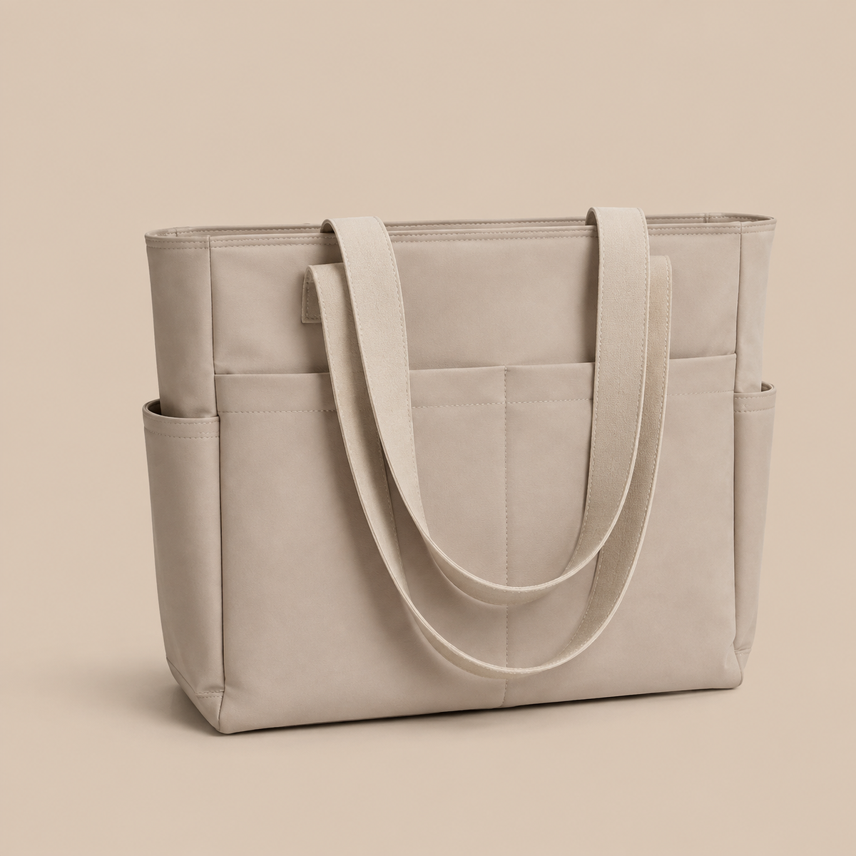 Grote beige dames shopper werktas met lange schouderbanden en opbergvakken